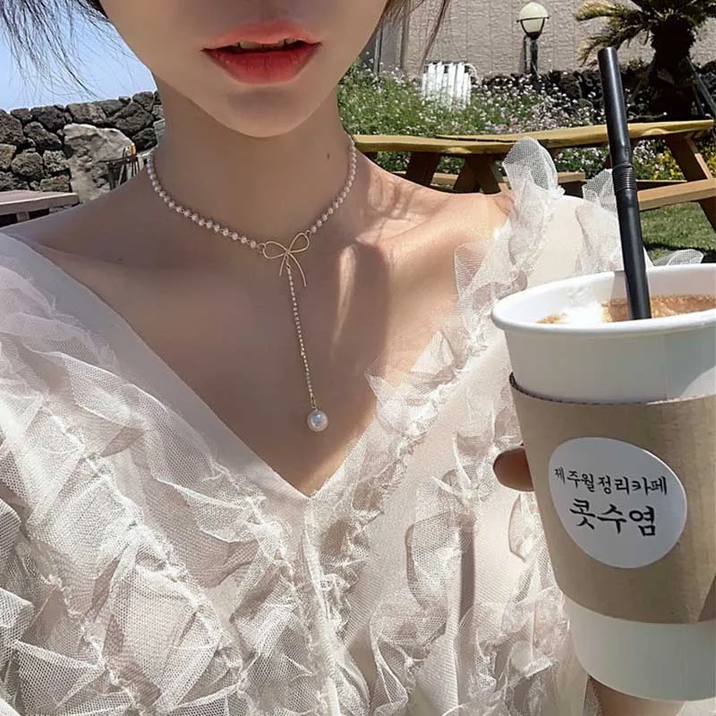 

New fashion personality bow knot diamond pearl pendant necklace female temperament exquisite clavicle chain