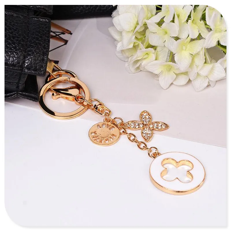 Цепочка для ключей в виде клевера изящная металлическая подвеска автомобиля