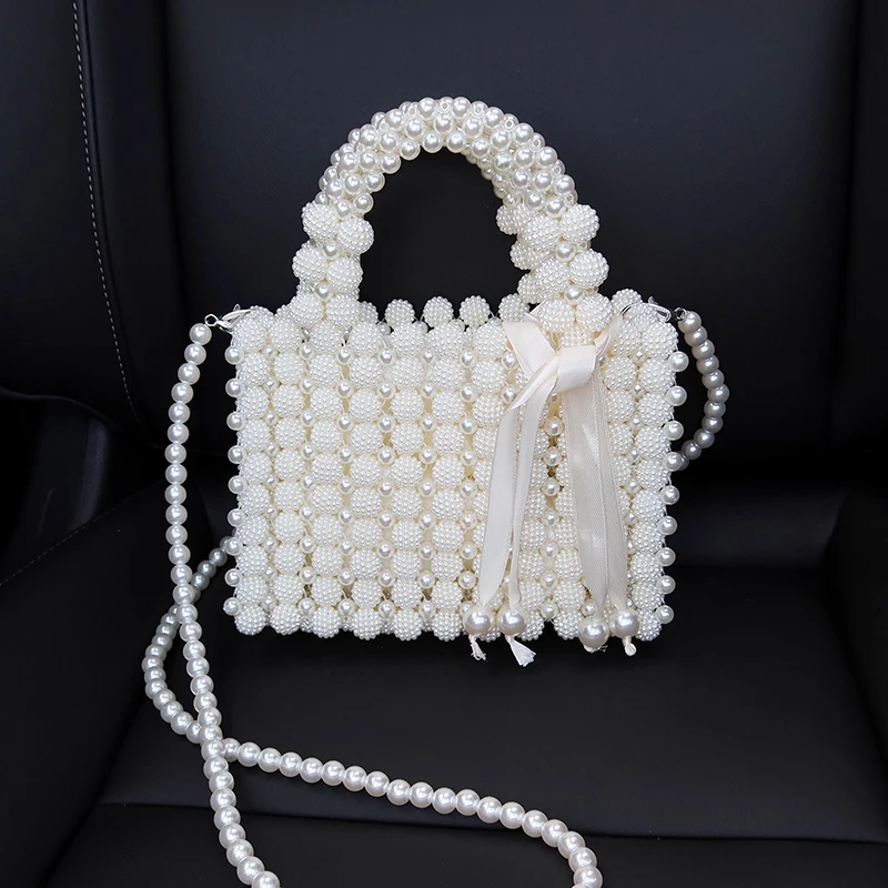 2021 New Handmade Beaded Hollow Pearl Bag Fashion Handbag Woven Mini Bucket Bag Solid Color Diagonal Mobile Phone Coin Purse