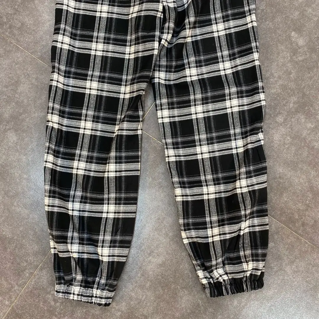 

ZCSMLL black plaid pants 2021 spring black and white color matching checkered hem closure chain label street casual pants