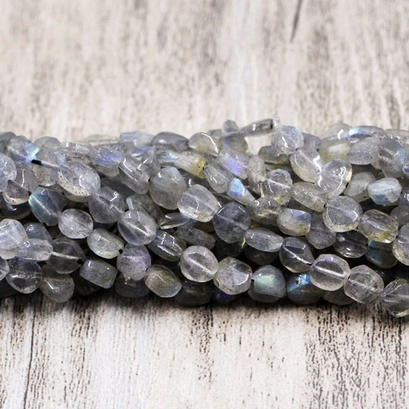 Натуральная подвеска неправильной формы серые бусины из камня Spectrolite граненый