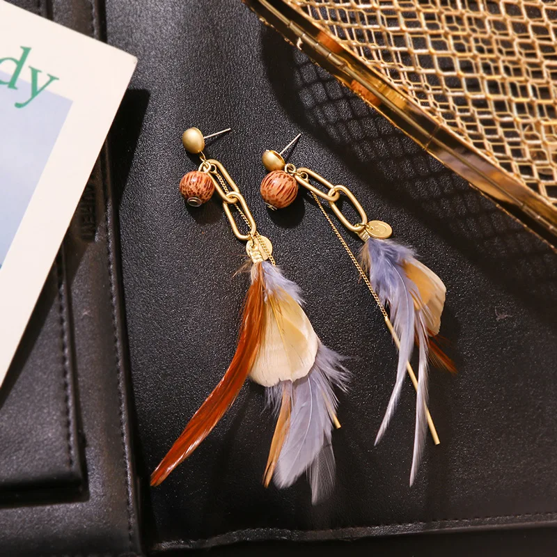 Длинные серьги с бахромой и золотыми перьями в стиле холодного ветра новые