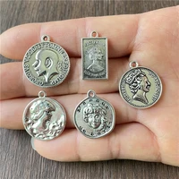 junkang 15pcs metal alloy antique silver various national head logo pendants diy handmade jewelry connection accessories
