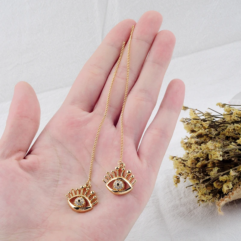 Женские серьги золотого цвета с длинной тонкой цепочкой уникальные кристаллами