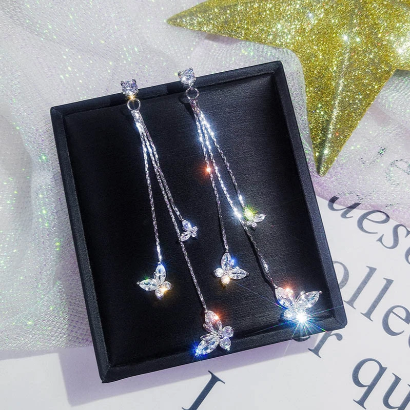 

New Korean White Crystal Butterfly Pendant Tassel Earrings Shining Zircon Personality Girl Earrings Elegant Fashion Earrings