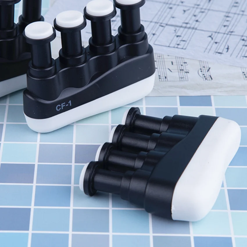 

Guitar Bass Piano Finger Training Professional Guitar Hand Finger Exerciser Medium Tension Hand Grip Power Trainer Guitar Parts