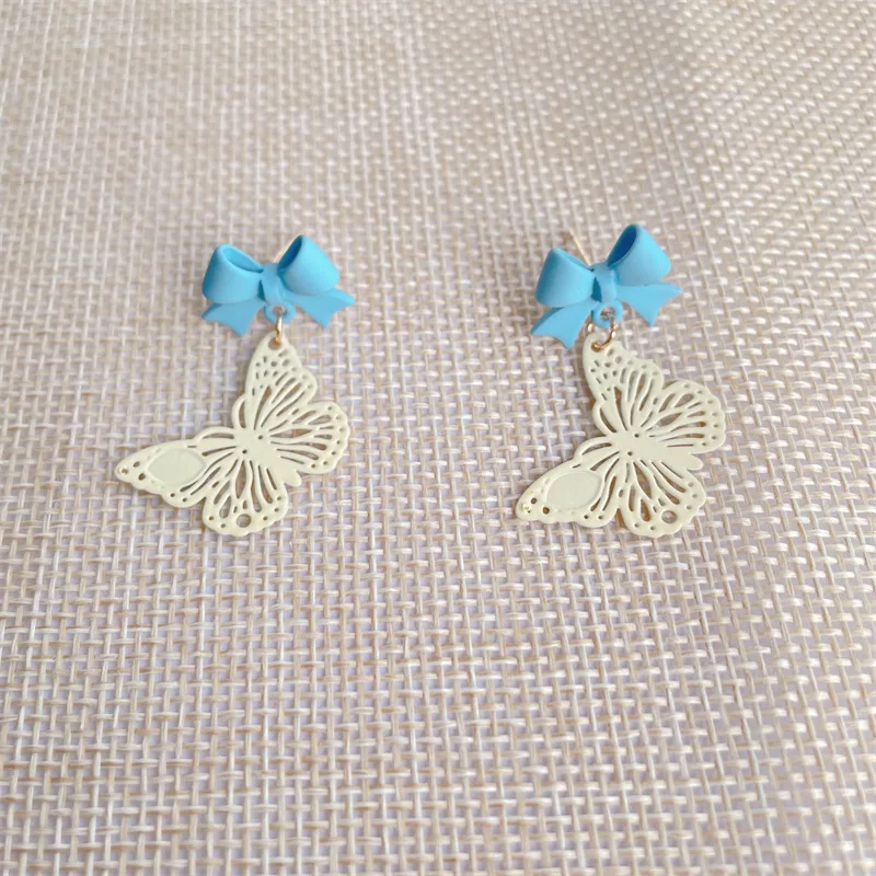 

Minar INS Fashion White Color Hollow Out Butterfly Earring for Women Ladies Blue Bowknot Dangle Drop Earrings Korean Jewelry