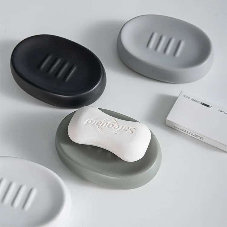 

Nordic ceramic soap dish hotel room supplies dish soap box matte four-color oval ceramic soap dish.