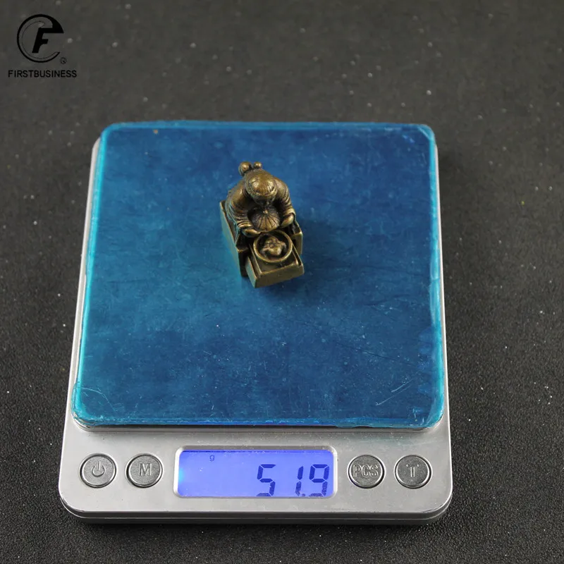 

Медная статуэтка жабы