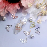 100pcs nail art butterfly frames 3d hollow 4 colors gems rhinestones for nail 6x8mm butterfly designer charms for gel polish