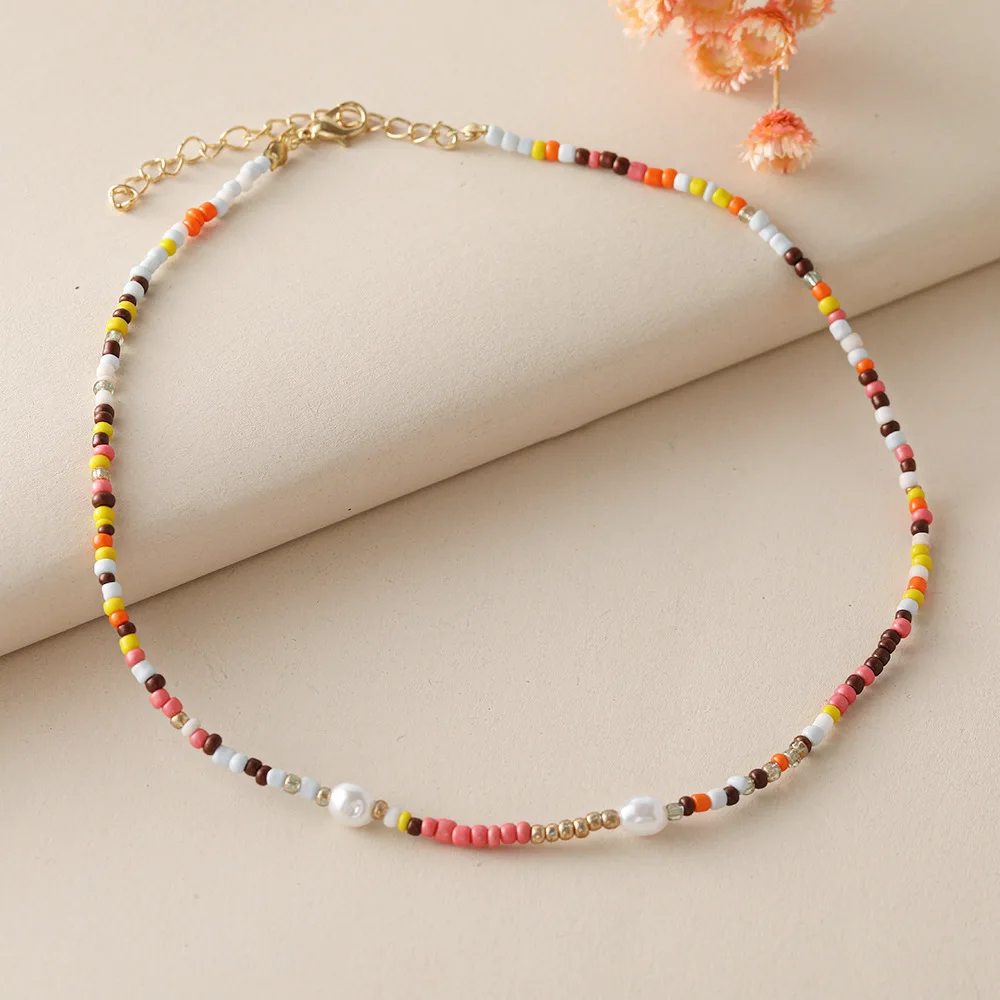

Macaroon color beads neck chain European and American ornaments creative color beaded pearl lock chain wholesale.