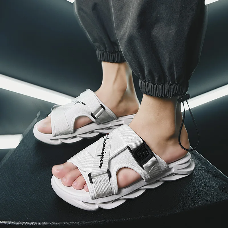 

Online celebrity slippers men's 2021 new summer trend Joker word drag men's wear beach sandals anti-slip dual-use