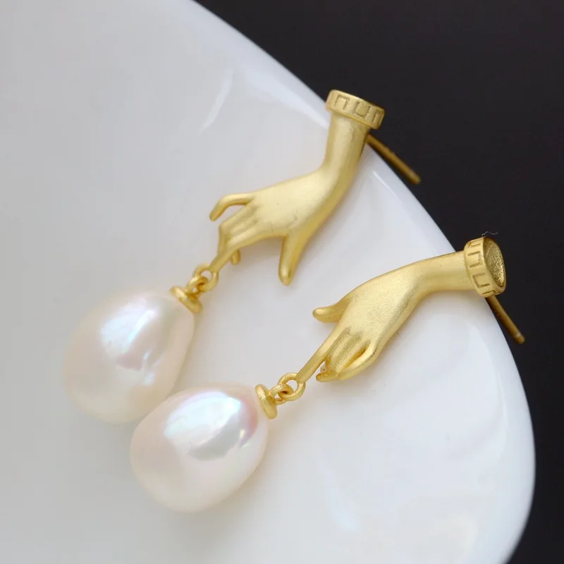 

Женские серьги-гвоздики из серебра 100% пробы с натуральным жемчугом