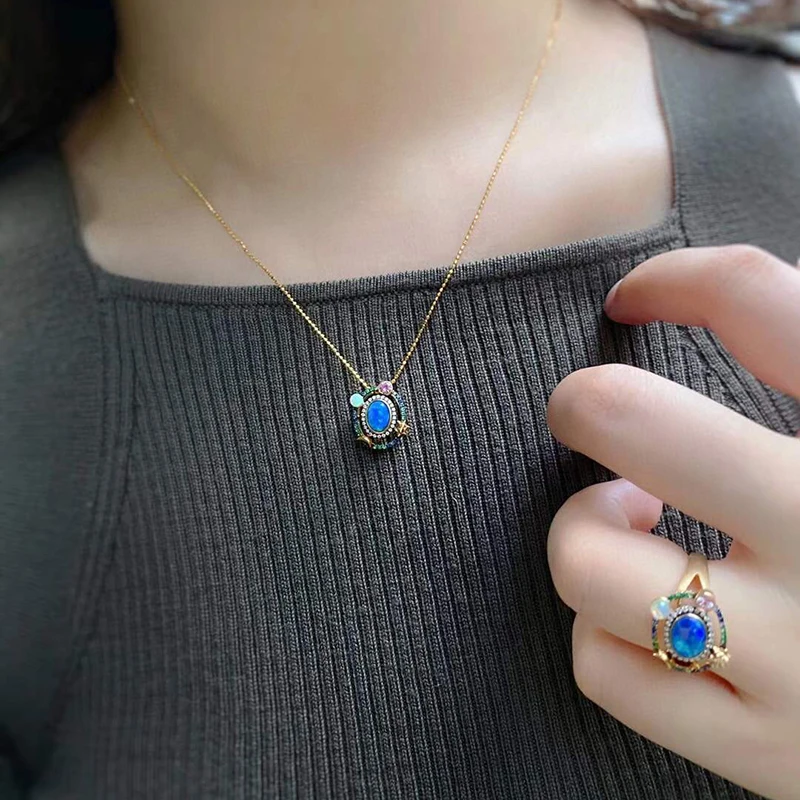 

AINUOSHI 18K Gold Oval-Shaped 0.6ct Natural Opal Multi-Gemstone Bohemia Style Halo Pendant Necklace for Women Jewelry 18''