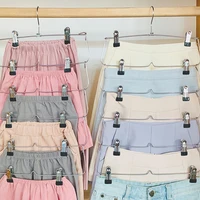 46 tier skirt pants shorts hangers with adjustable clips space saving no slip 12 clips clothing storage metal skirt rack