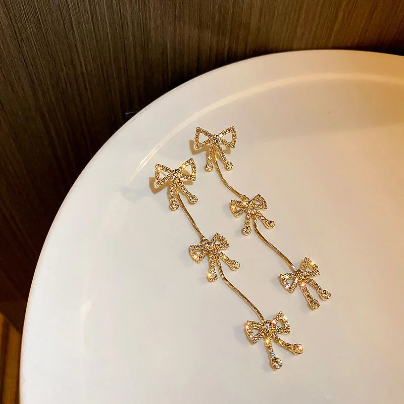 

Bow Tassel Dangle Earrings Gold Plated Crystal Earrings for Women Fashion Exaggerated Jewelry Wedding Drop Earrings Accessories