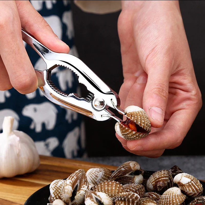 

Зажим для моллюсков, цинковый сплав, зажим для морской еды, автоматический дизайн, зажим для еды, кухонный многофункциональный зажим для мол...