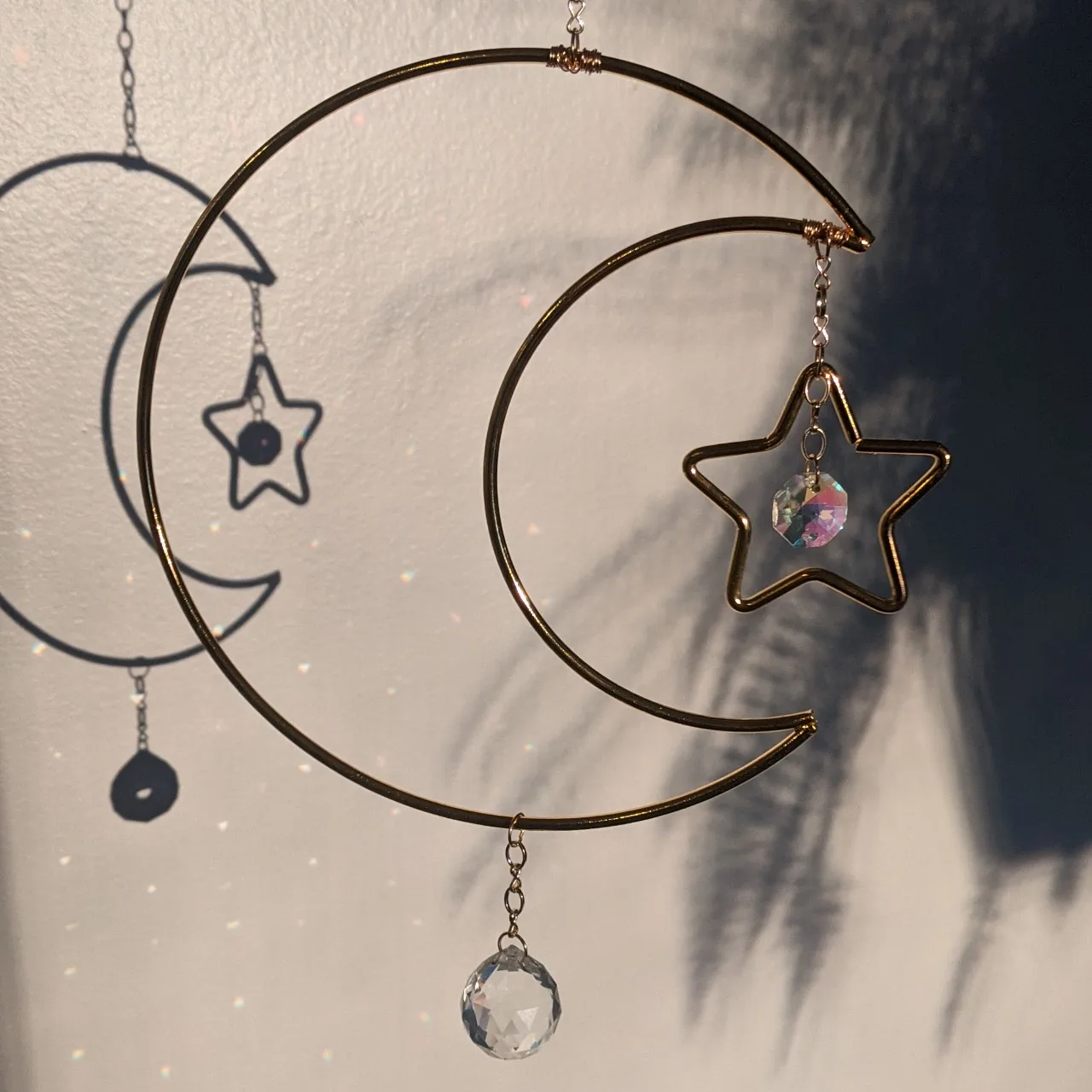 

gold moon and star sun catcher with rainbow prism and star charms|light catcher | rainbow maker | sun & moon | gift of good luck