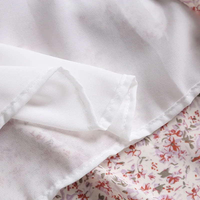 

Korean Version of Women's New V-neck Lace Stitched Shredded Flower Sling Dress