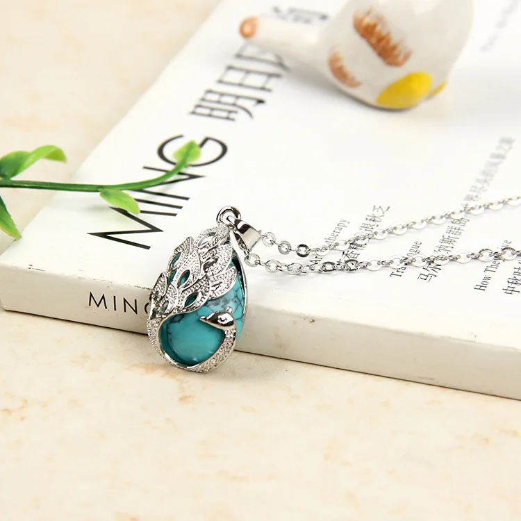 Подвеска в виде капли воды из натурального разноцветного кристалла