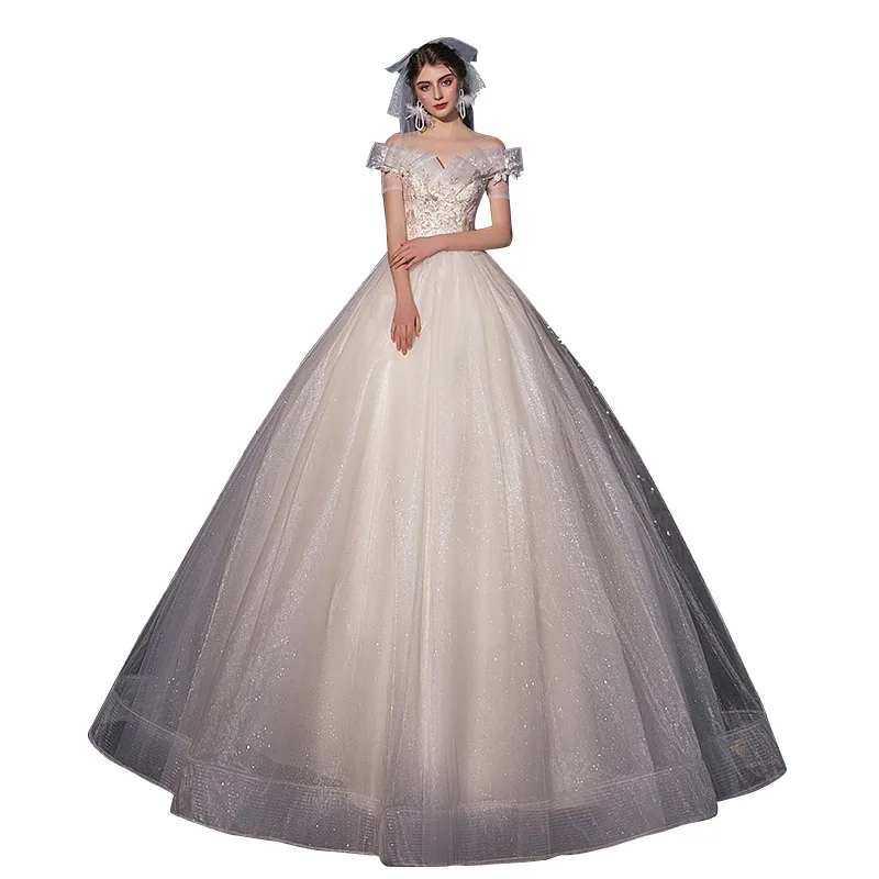 

Trendy And Gorgeous Light Champagne Wedding Dress New Starry Sky Dream Large Shoulder Long Tail Wedding Dresses