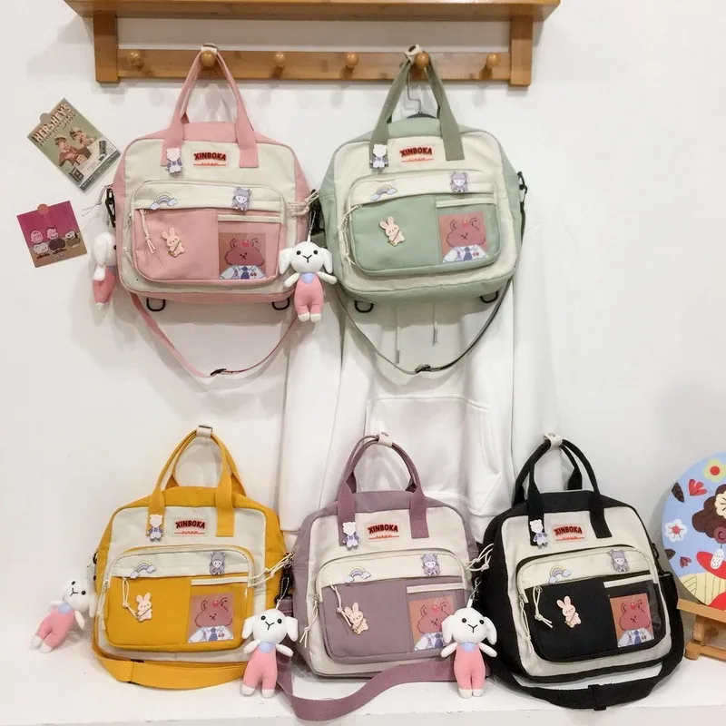 

Women's backpack New nylon Kawaii Backpacks for women Cute badge School backpack for girls fashion Shoulder bag 2021 Women's bag