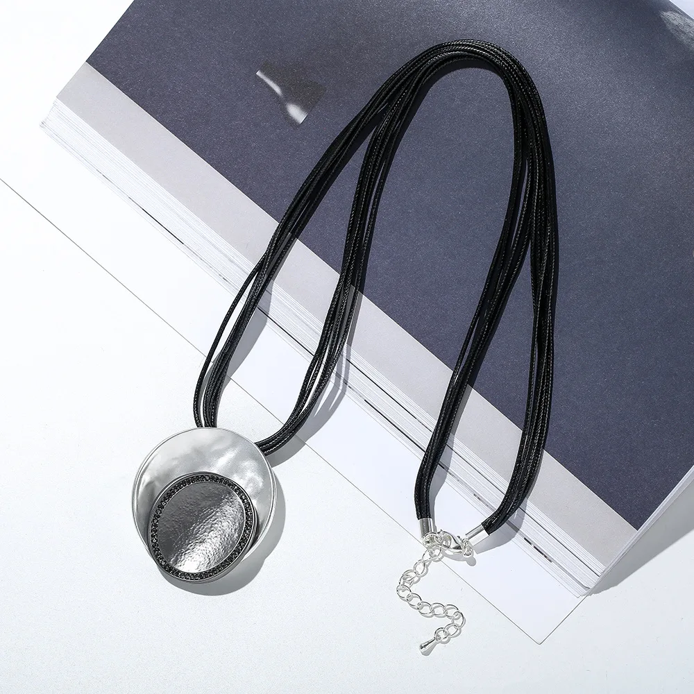 

Amorcome Handemade Sweater Necklace Long Chain Tassel Multilayer Leather Necklace With Large Geometric Round Pendant Collar