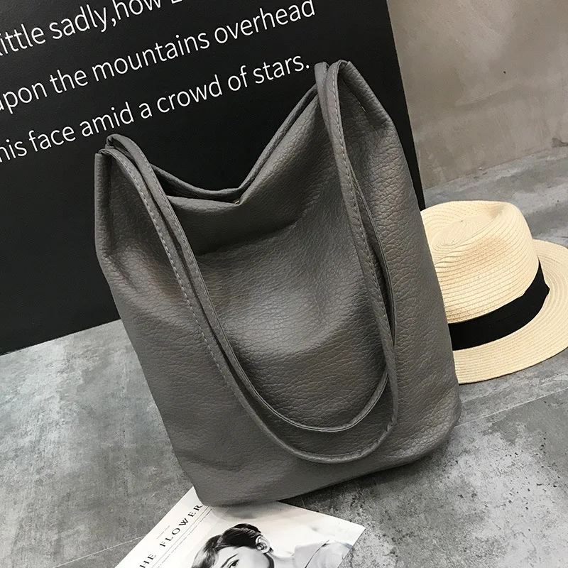 

New simple solid color fashion lady bag shoulder bag PU lady handbag multi-color bucket bag retro style shopping bag