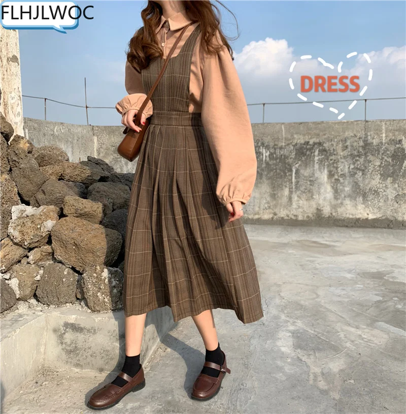 

Платье-рубашка в клетку, без рукавов