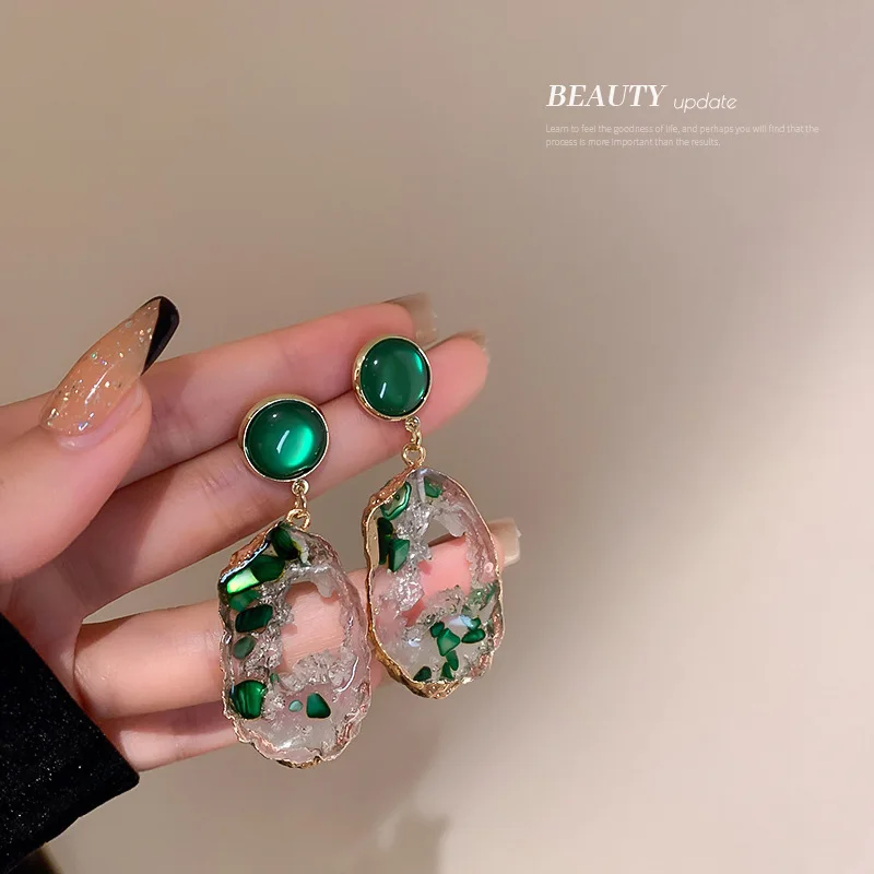

Korean Irregular Hollowed Out Fashion Retro Emerald Temperament Minority High Sense Versatile Earrings