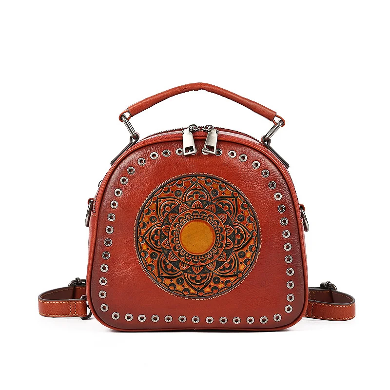 Women's bag 2021 new leather women's head round hole totem portable single shoulder |