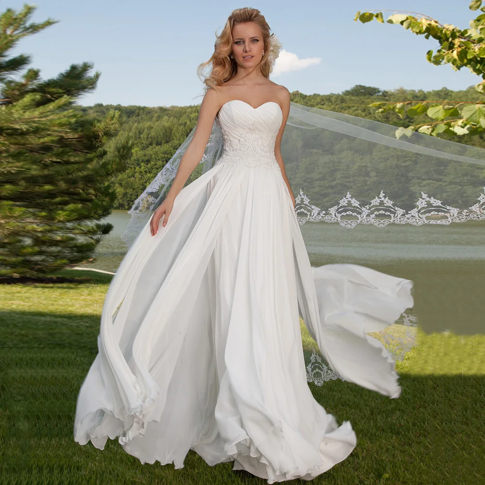 

Jiayigong сексуальный вырез сердечком, без рукавов свадебное платье с рюшами и аппликацией трапециевидной формы шифоновое пляжное свадебное пл...