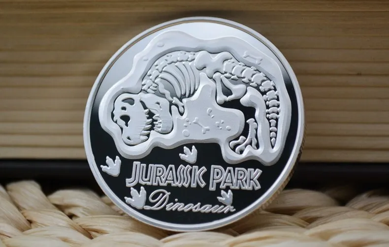 Памятная монета в стиле парка Юрского периода с золотым и серебряным покрытием