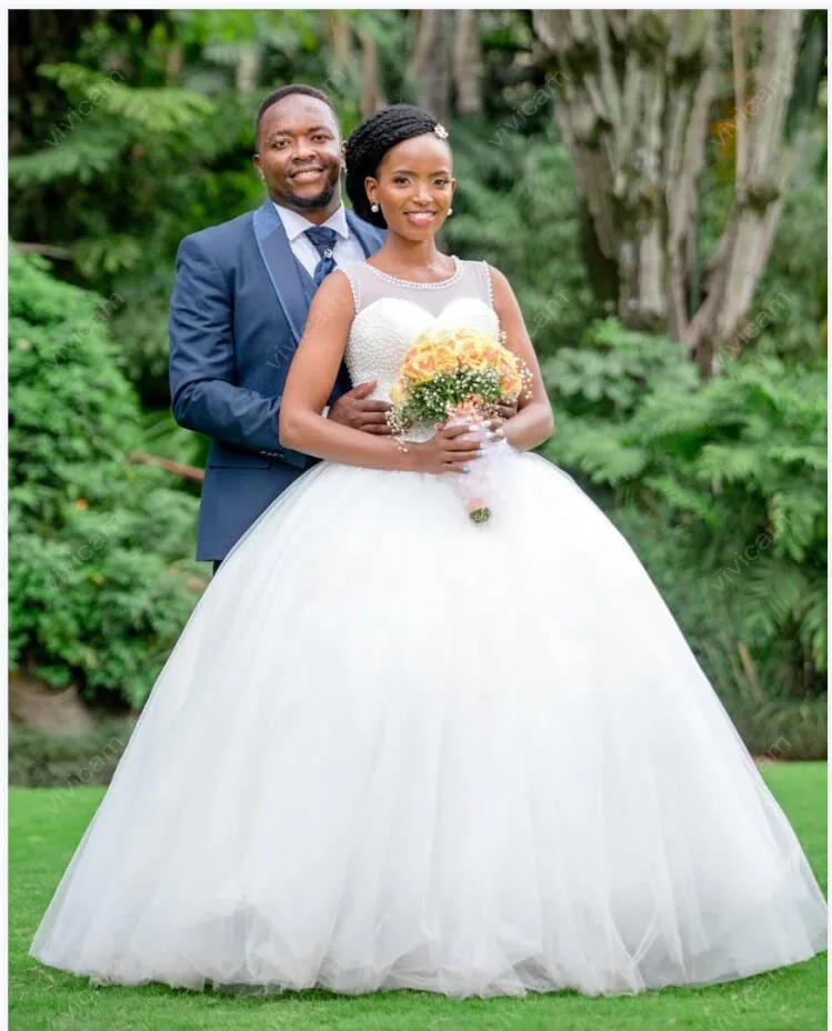 

Elegant Robe De Mariee Top Pearls Sleevless Ballgown Wedding Dresses Court Train Tulle Plus Size African Bridal Gowns