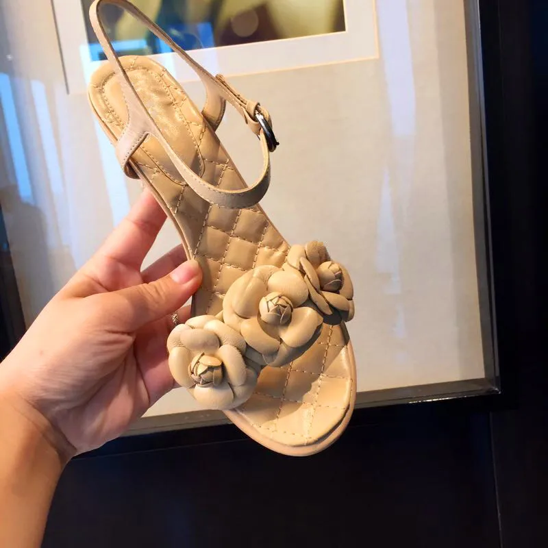 

Ollymurs Summer ladies high heels flower decoration round head thick heel full leather sandals fashion party sandals