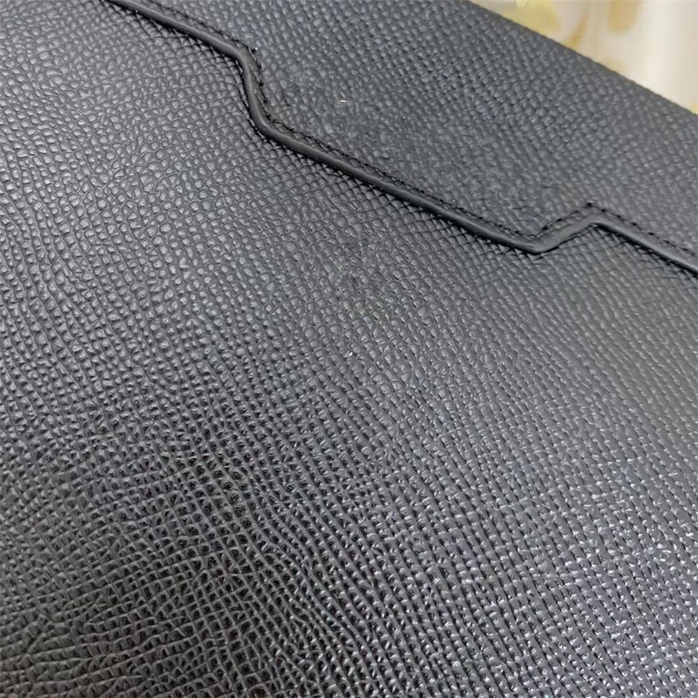 

New leather men and women large-capacity fashion handbag messenger bag clutch