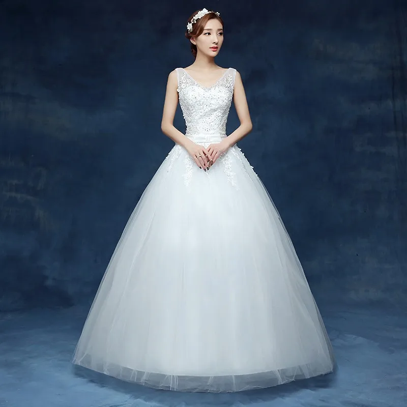 Женское свадебное платье с блестками белое на завязках V образным вырезом модель