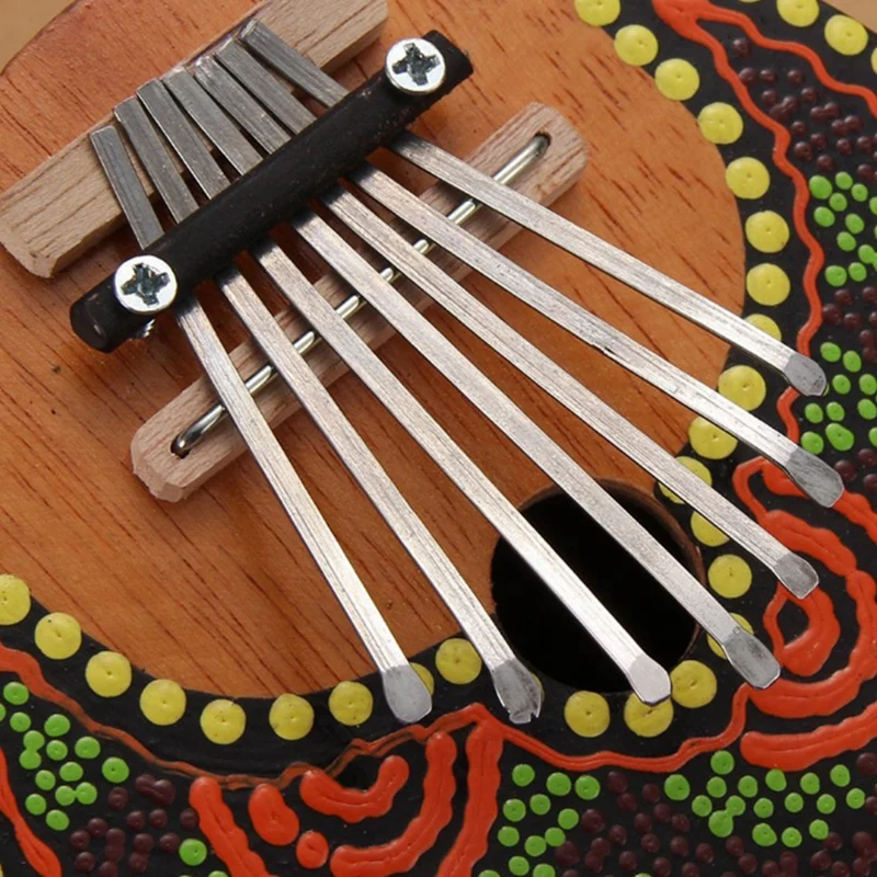 

7 Key Portable Mini Kalimba Colored Drawing Coconut Shell Thumb Piano Mbira Natural Key Board Instrument(Random Pattern)