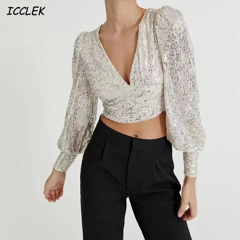 

Блузка женская новогодняя с блестками и глубоким V-образным вырезом