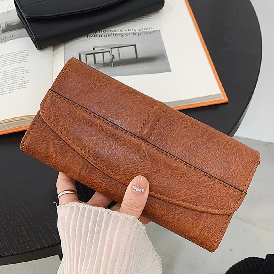 

Женский Длинный кошелек в стиле ретро, складной бумажник из искусственной кожи, популярный кожаный держатель для мелочи, кредитных карт, уд...