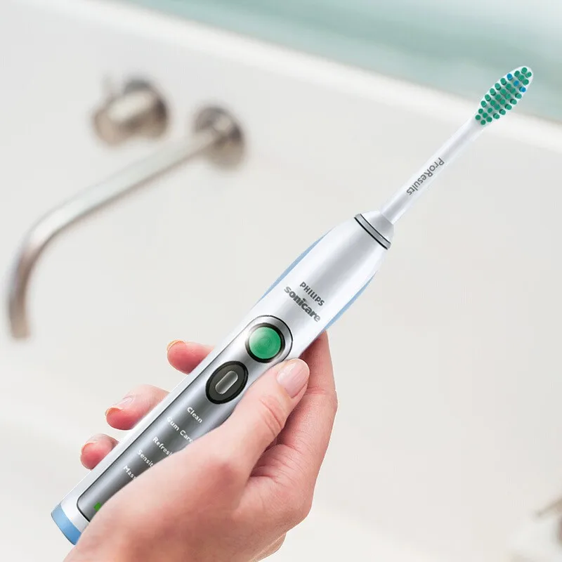 Электрическая зубная щетка Philips Sonicare HX6972/10 Smartimer и Quadpacer белого серебристого цвета