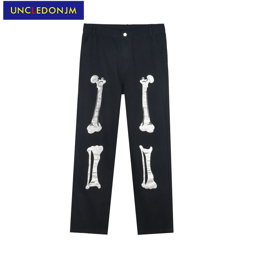 

Дизайнерские мужские брюки UNCLEDONJM, дизайнерские джинсы для мужчин, потертые черные брюки, мужские свободные джинсы в стиле хип-хоп