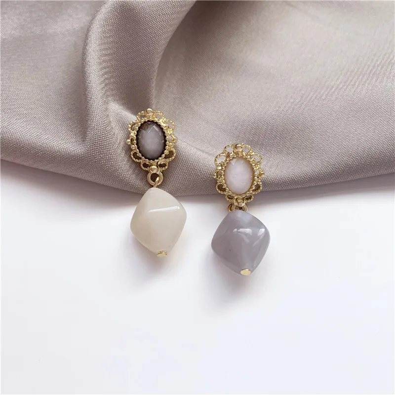 S925 Серебряные иглы Асимметричные личности полые серьги в виде цветка изысканный