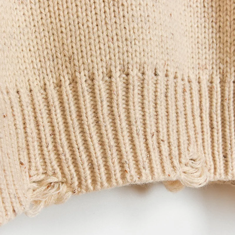 

The new winter 2020 coarse needle beggar hole bad side cartoon bear hedge female O21117 round collar knitting sweater