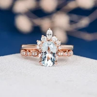 CxsJeremy Oval Cut 7*9mm Aquamarine Ring Set Solid 14K Rose Gold Unique Bridal Set Marquise Moissanite diamond Wedding Band 2PCS