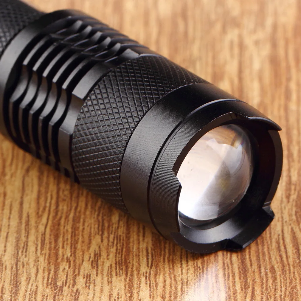 

New XML Hunting light LED Zoomable Focus 320LM Mini Flashlight Torch Camping Lights free shipping