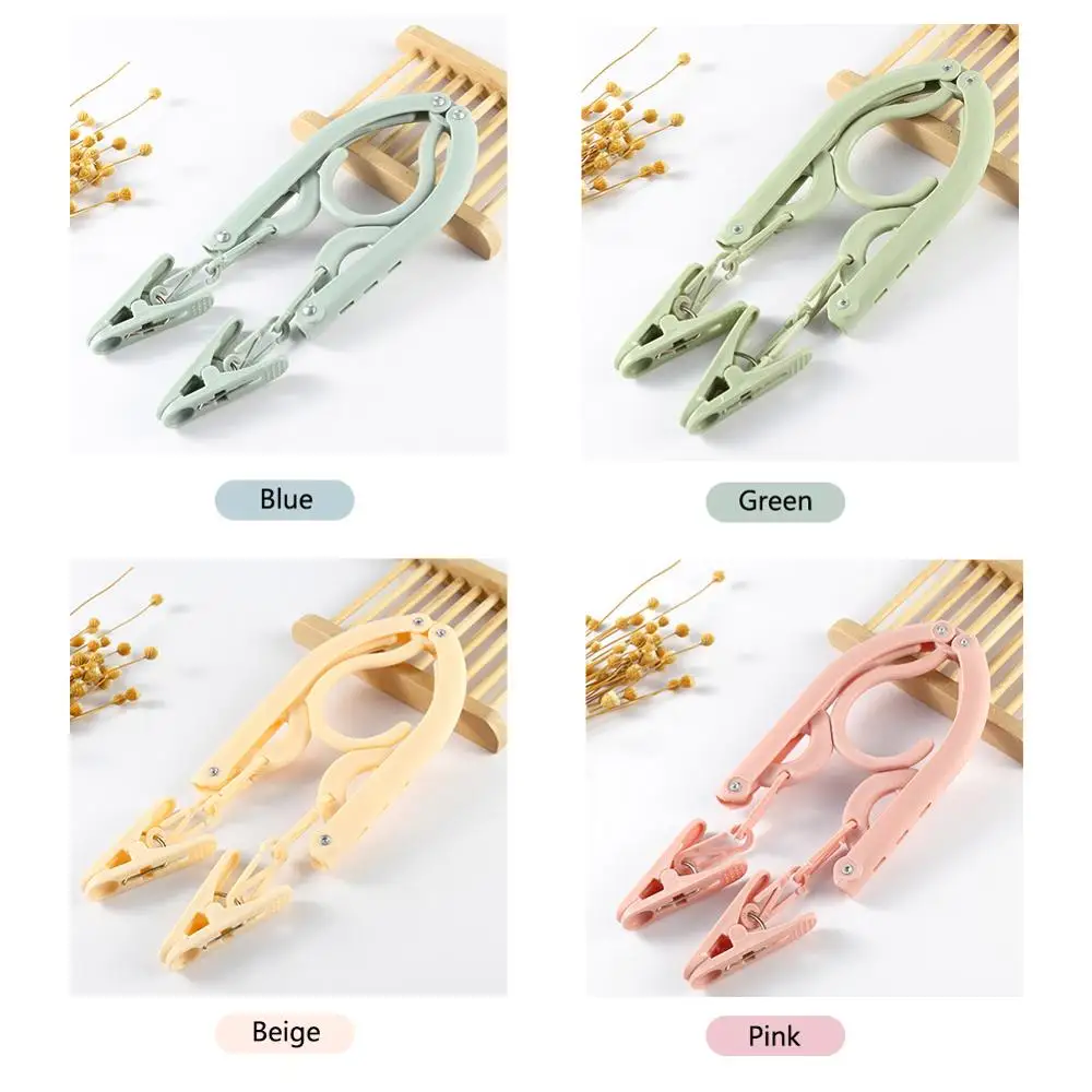 Travel clothes hanger Portable Folding Clothes Hanger Multifunction Magic Stretch Drying Rack Home Wardrobe Storage | Дом и сад