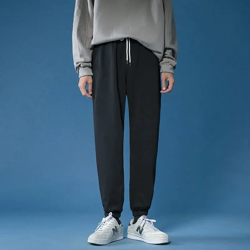 

Men's trousers 2021 spring and autumn new solid color casual pants sweat shirt pants large size S-5XL youth men's clothing