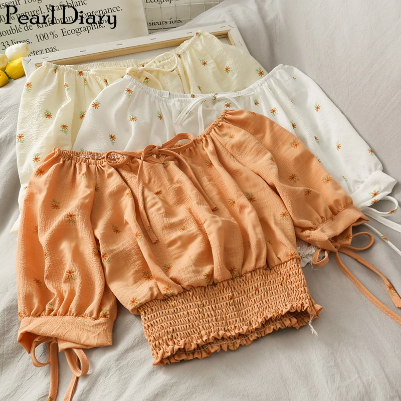 

Pearl Diary Women Daisy Flower Print Cropped Blouse Slash Elasticated Neck Bow Tied Strap Sweet Top Smocked Hemline Candy Color