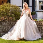 Платье свадебное трапециевидное на тонких бретельках, тюлевое с аппликацией, с открытой спиной, цвета шампанского, индивидуальный пошив